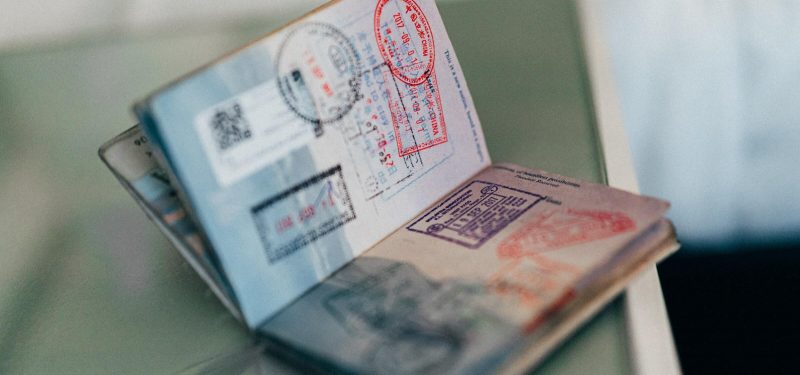 Entry, exit and visa stamps in passport