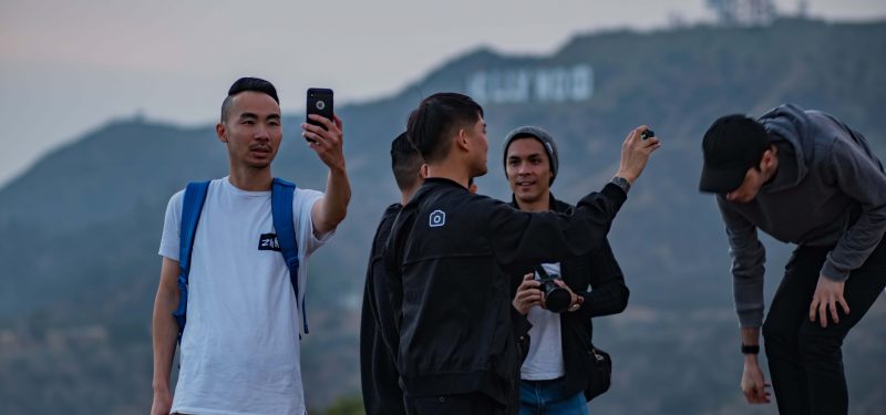 People Taking Photo on Building by Sherman Yang on Unsplash